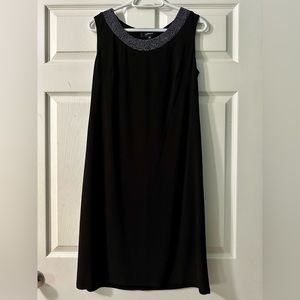 Selling my black knee length dress with the cover as a pair worn twice